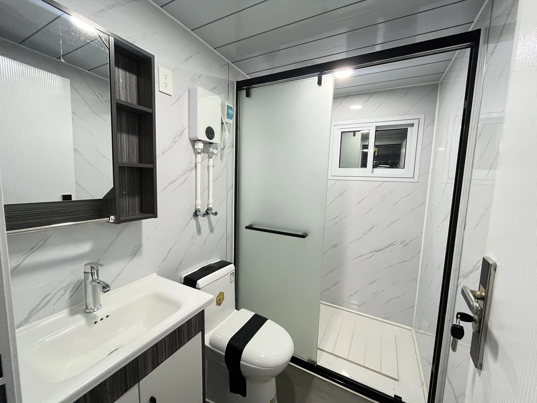 Interior de casa modular: Baño, foto 1